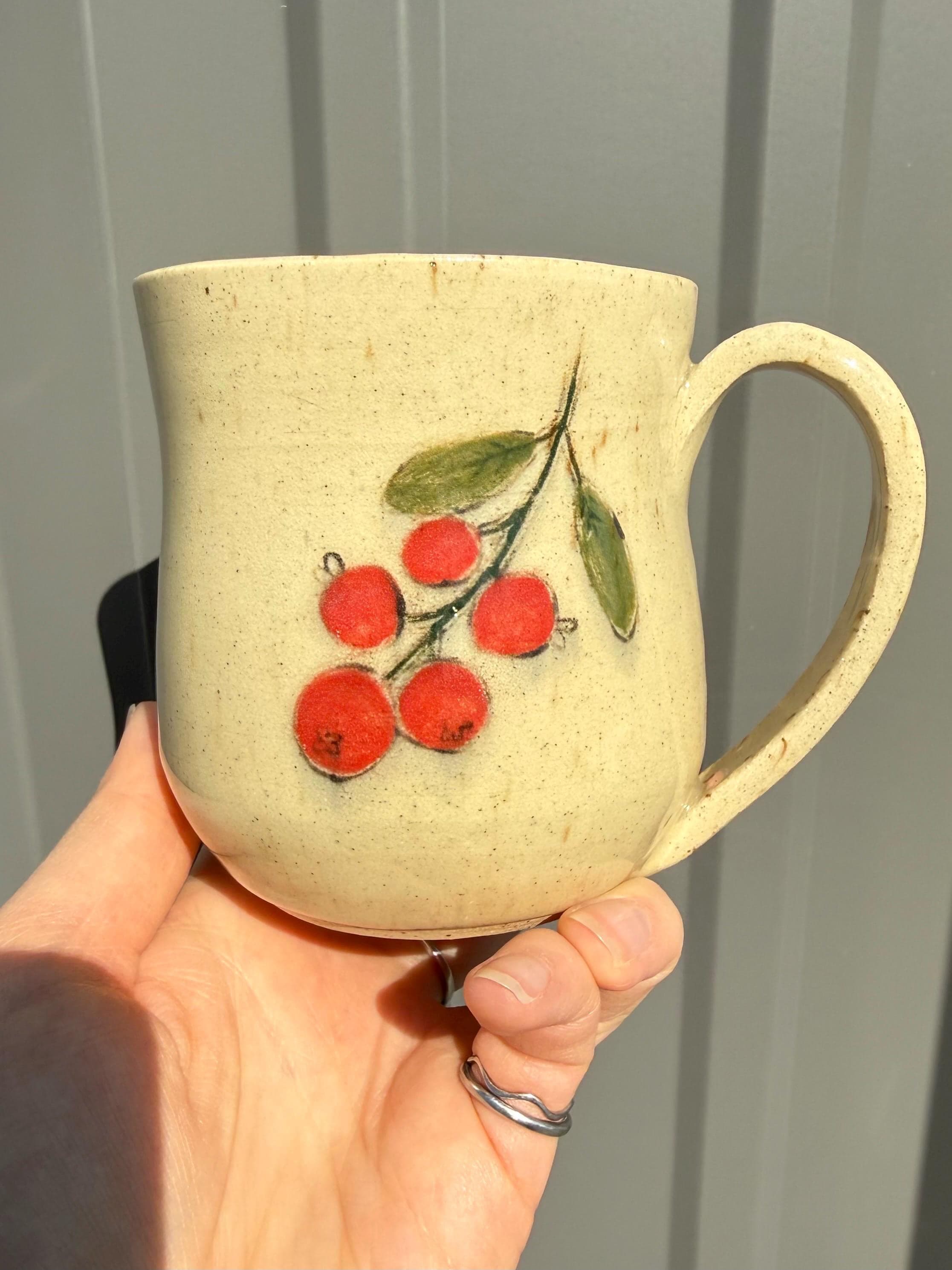 Hand-painted cranberry ceramic mug